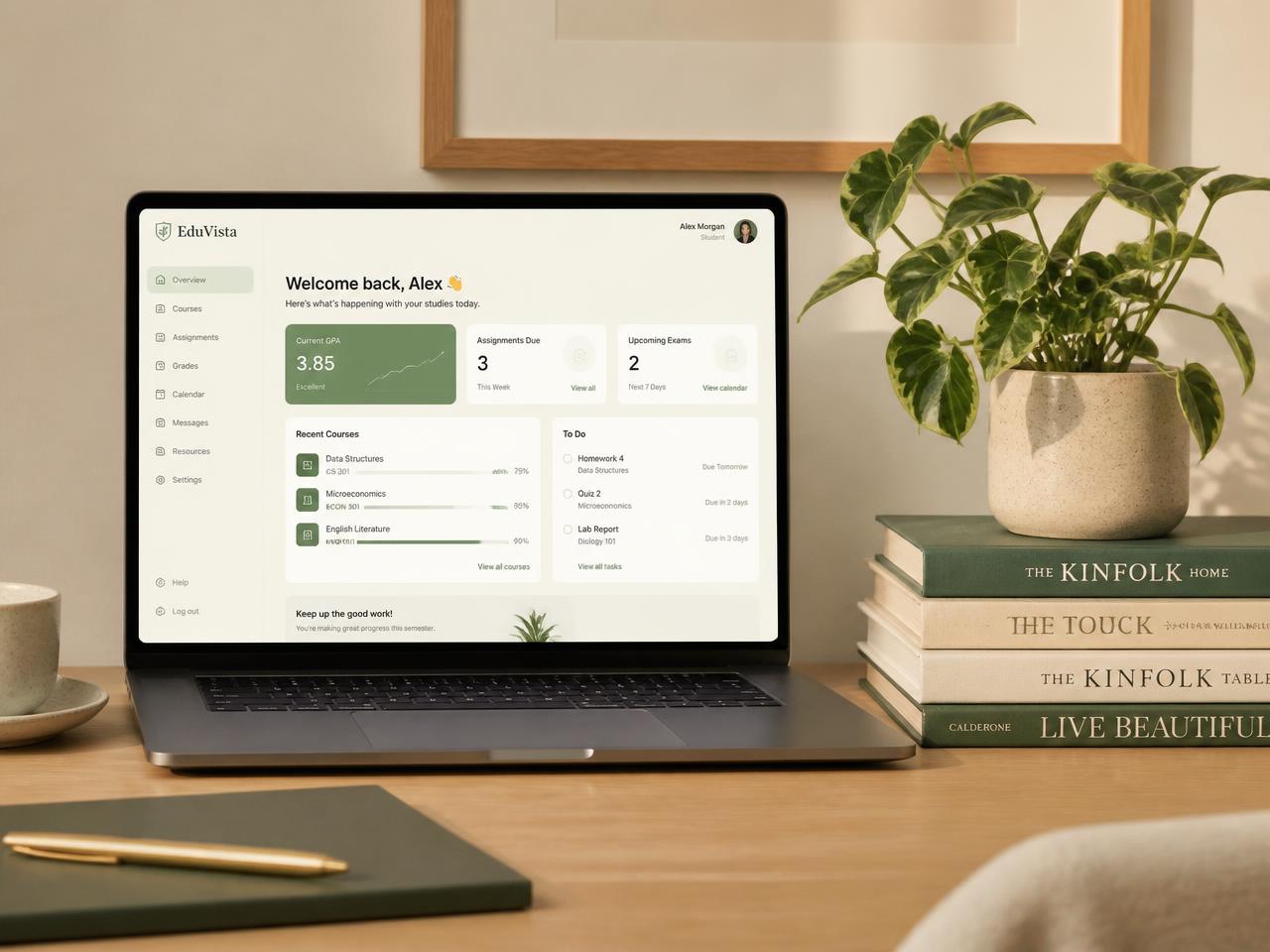 Acadryn dashboard running on a laptop beside books and a plant
